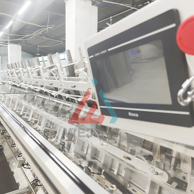 Macchina riempitrice per maschere facciali